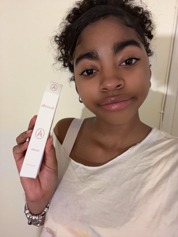 Medelin with her Vanilla lip balm