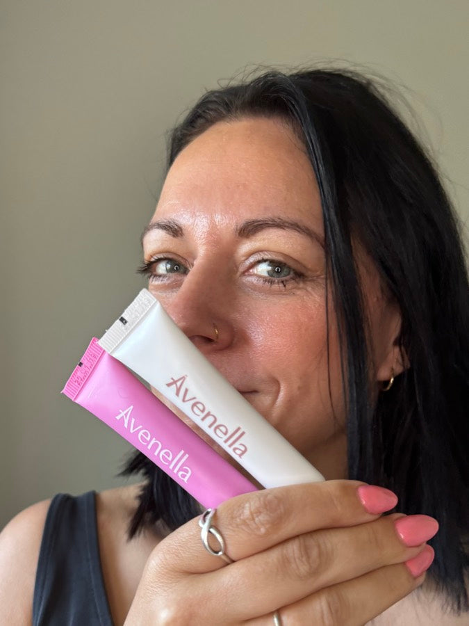 Jess holding her Rose and Vanilla lip balms