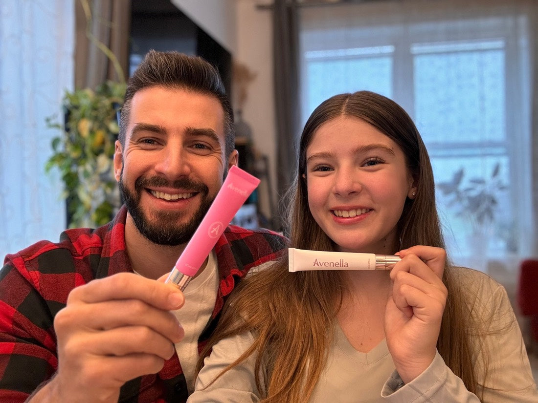 Vadim and his daughter holding the lip balms they created together